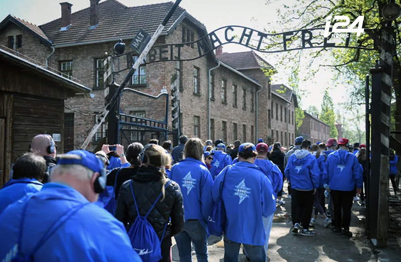 Neishlos attending March of the living in Poland in front of the entrance to Auschwitz camp